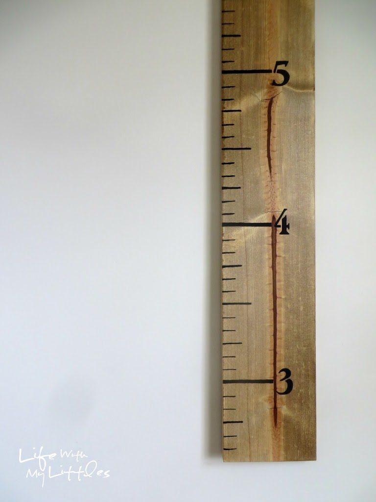 Easy DIY Growth Ruler: A cheap handmade growth chart that is simple and looks great in any room. The perfect way to chart your kids' growth!