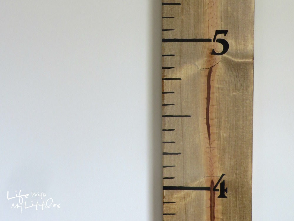 Easy DIY Growth Ruler: A cheap handmade growth chart that is simple and looks great in any room. The perfect way to chart your kids' growth!
