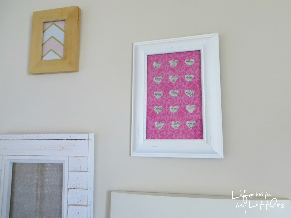 Easy Heart-Punched Dictionary Art: A beautiful, easy, and cute way to decorate a baby girl's nursery.