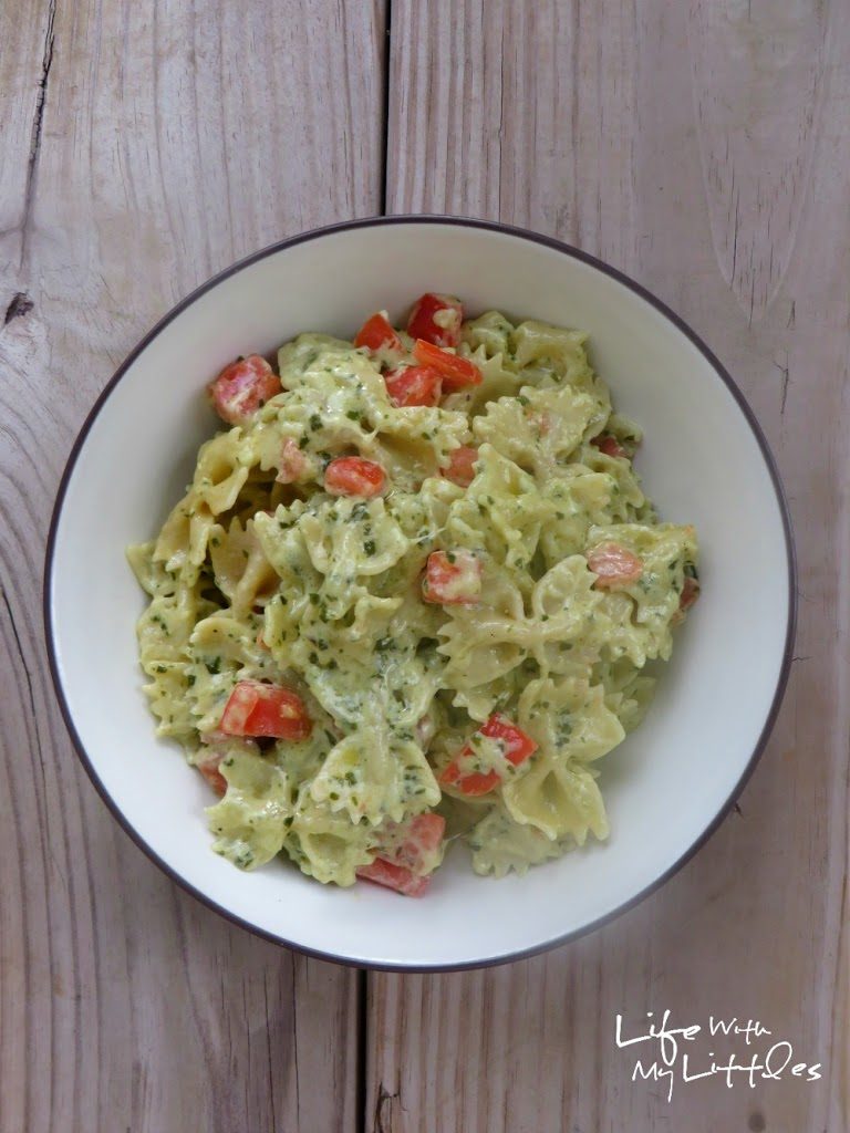 Cheesy Pesto and Tomato Pasta: A creamy, cheesy pasta made with homemade basil pesto and tossed with garden-fresh tomatoes! Perfect for a quick weeknight dinner!