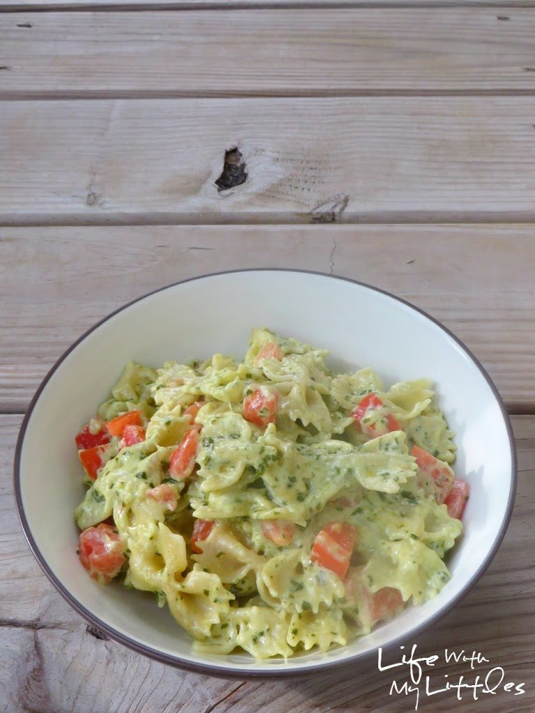 Cheesy Pesto and Tomato Pasta: A creamy, cheesy pasta made with homemade basil pesto and tossed with garden-fresh tomatoes! Perfect for a quick weeknight dinner!