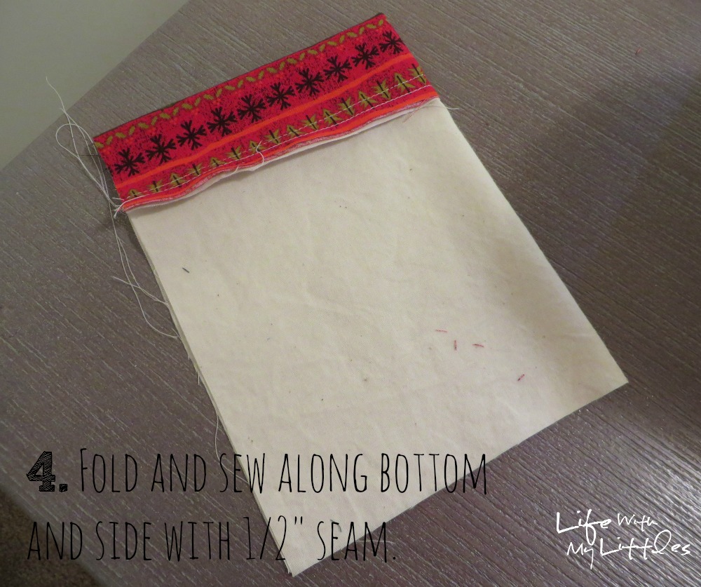 DIY Advent Calendar Garland: Simple fabric pockets make up this cute and easy Christmas advent calendar! DIY Advent Calendar Garland: Simple fabric pockets make up this cute and easy Christmas advent calendar!