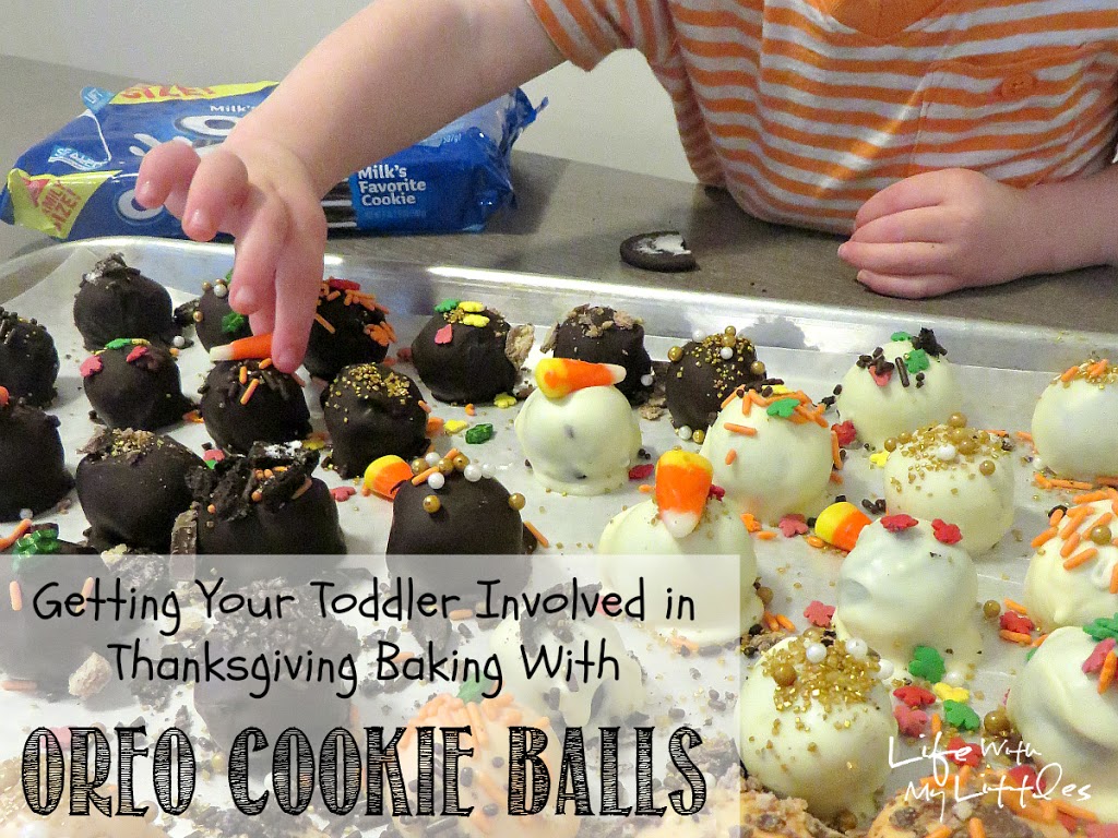 Here's an easy way to get your toddler involved in Thanksgiving baking by decorating OREO Cookie Balls! 