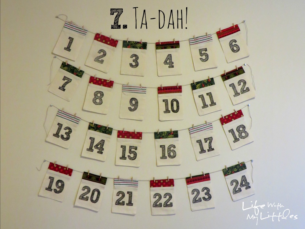 DIY Advent Calendar Garland: Simple fabric pockets make up this cute and easy Christmas advent calendar! DIY Advent Calendar Garland: Simple fabric pockets make up this cute and easy Christmas advent calendar!