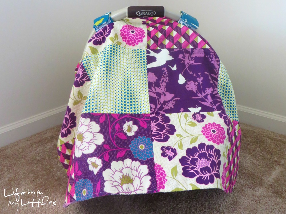 Quilted Car Seat Cover Tutorial: An easy-to-follow tutorial to sew your own car seat cover using multiple fabrics! Perfect for baby!