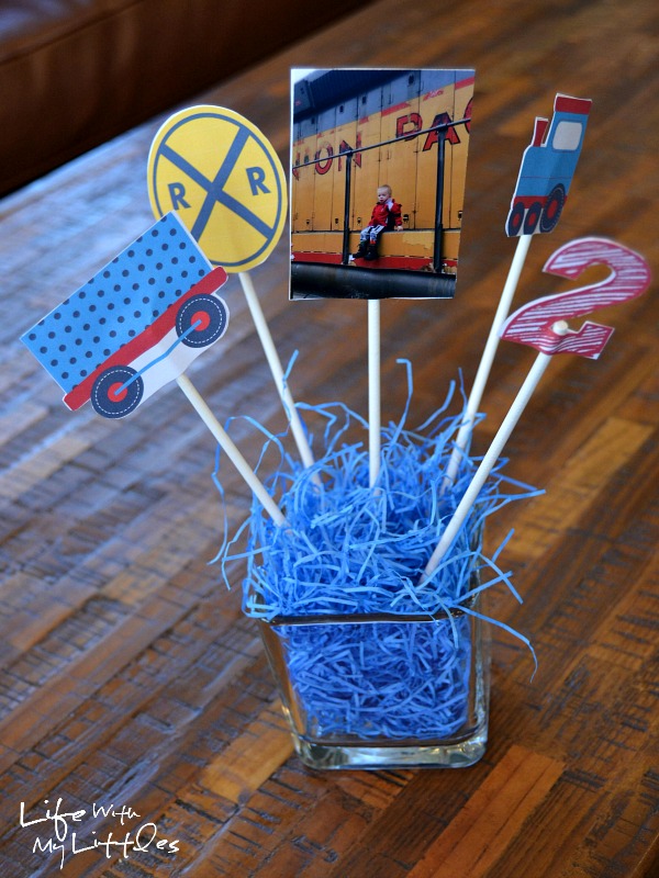 Ideas for a little boy train birthday party. Complete with food ideas, decorations, party favors, and keepsake ideas!