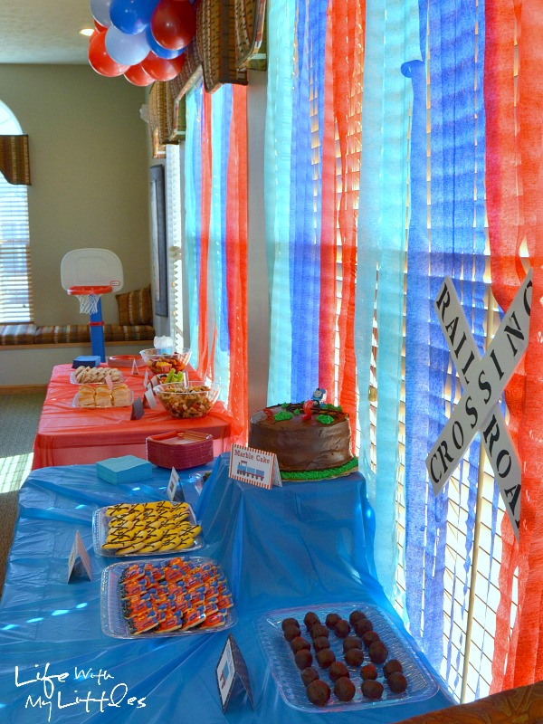 Ideas for a little boy train birthday party. Complete with food ideas, decorations, party favors, and keepsake ideas!