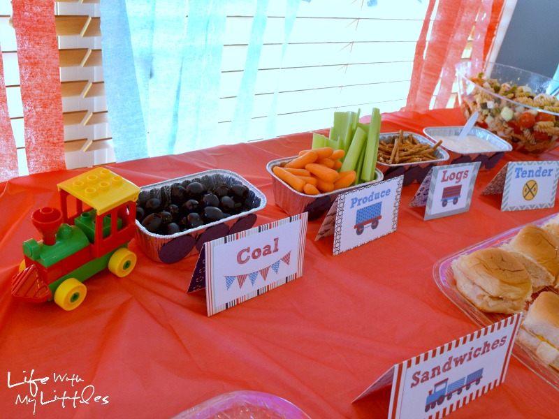 Ideas for a little boy train birthday party. Complete with food ideas, decorations, party favors, and keepsake ideas!