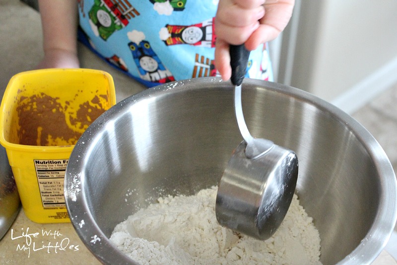 Tips for cooking with a toddler. How to cook with a toddler to make it fun, easy, and safe for both of you!