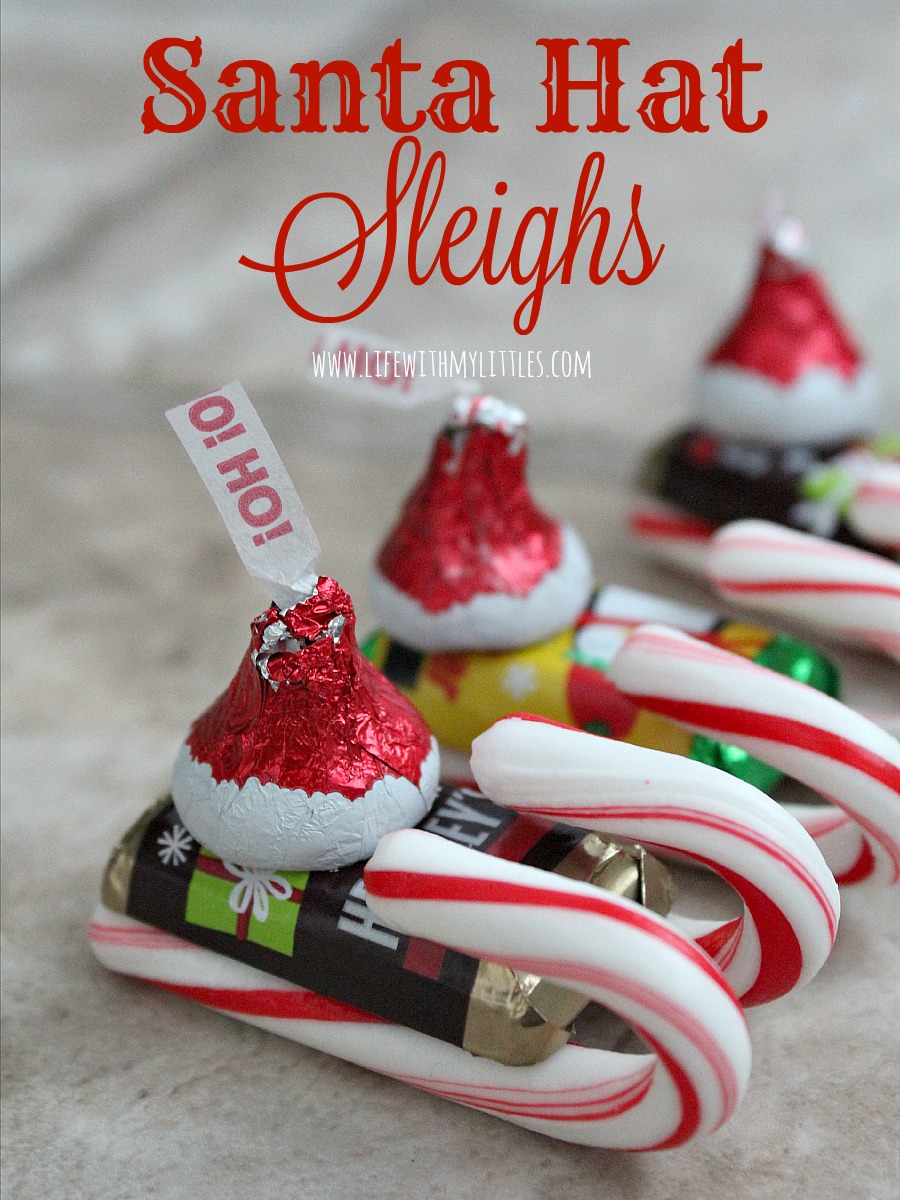 These easy candy Santa Hat Sleighs are perfect for neighbor gifts, teachers, or anyone! And they are so easy that little kids can help! What a simple DIY Christmas craft for kids!