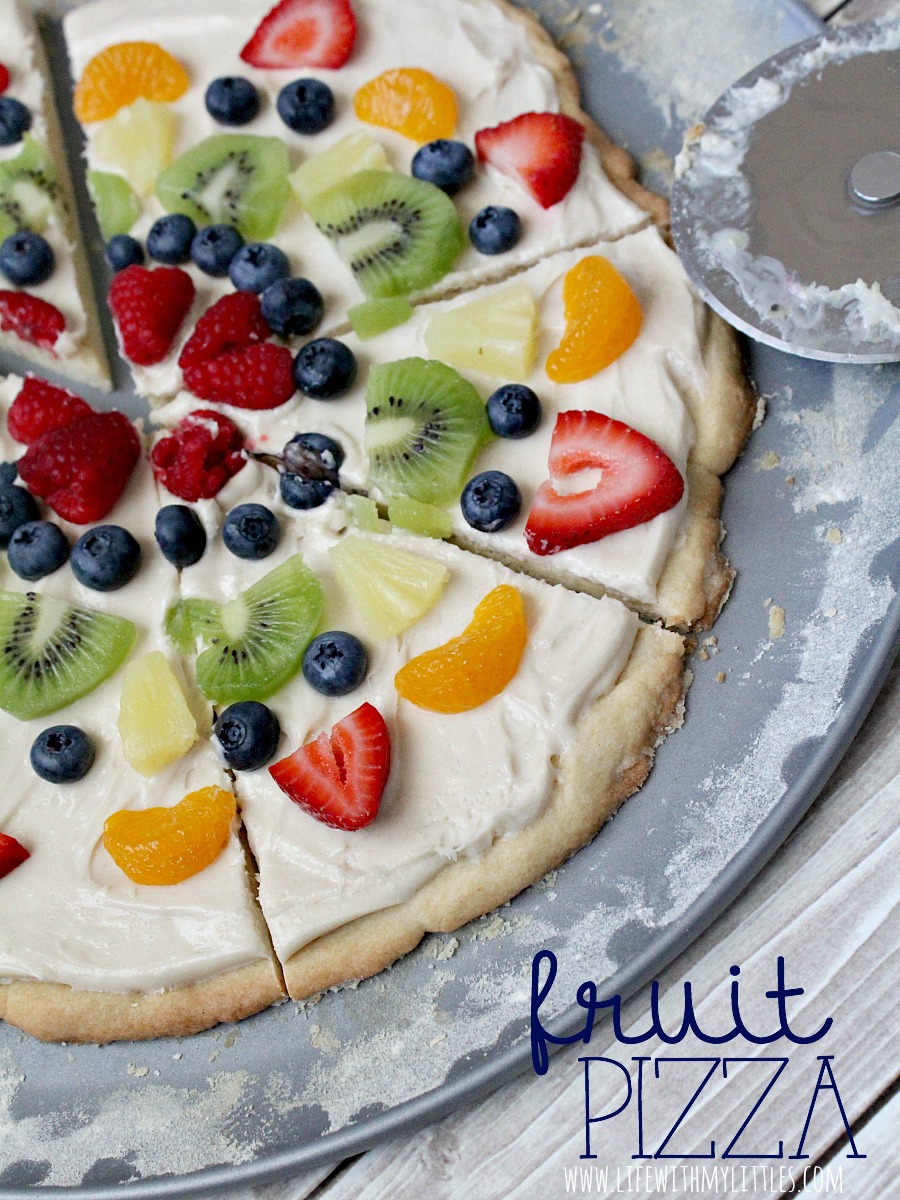 This fruit pizza is so easy and so yummy! The best way to eat fruit! A layer of soft sugar cookie, topped with cream cheese frosting, and colorful fruit! The perfect dessert for your next party!