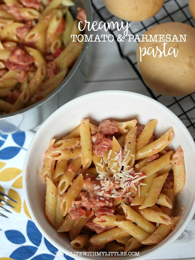 This creamy tomato and parmesan pasta is super easy and can be on the table in 25 minutes! A great meatless dinner idea for those busy weeknights!