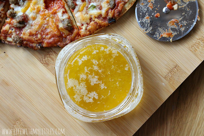 This garlic butter dipping sauce is the perfect dip or side for your pizza party! It's not greasy and not too garlicky like some dips. Tastes just like Dominos garlic butter sauce and it only takes three ingredients!