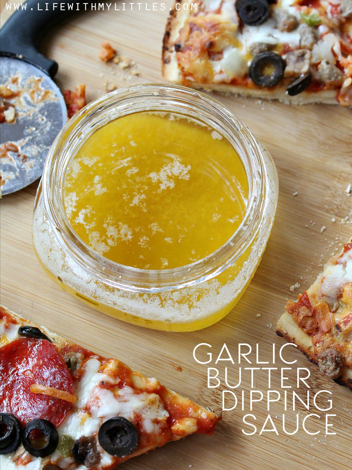 This garlic butter dipping sauce is the perfect dip or side for your pizza party! It's not greasy and not too garlicky like some dips. Tastes just like Dominos garlic butter sauce and it only takes three ingredients!