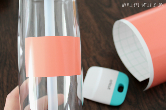 Customize your own water bottle in just a few minutes with the new Cricut Joy! This tutorial includes a free cut file for a "Mamas Run the World" water bottle decal that's perfect for moms who love to run!