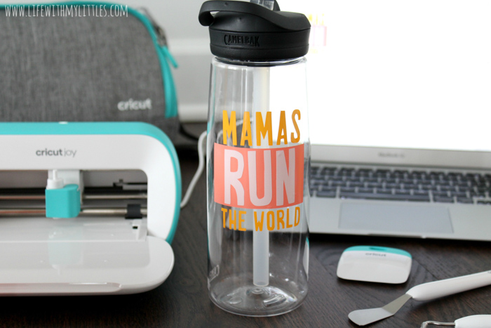 Customize your own water bottle in just a few minutes with the new Cricut Joy! This tutorial includes a free cut file for a "Mamas Run the World" water bottle decal that's perfect for moms who love to run!