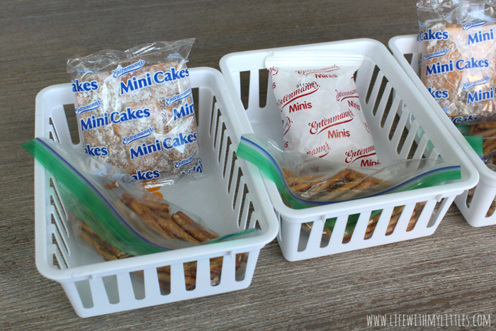 Daily snack bins are the perfect way to end the constant battle over snacktime! Put your kids' snacks in them in the morning, and they get to decide when to eat them! An easy, DIY solution that stops pestering and teaches self-control!