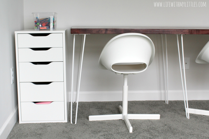 A simple, minimalist DIY triple desk tutorial that even the most beginning of DIYers can tackle! The butcher block countertop gives it a beautiful farmhouse feel and it's perfect for any homework or homeschool room!